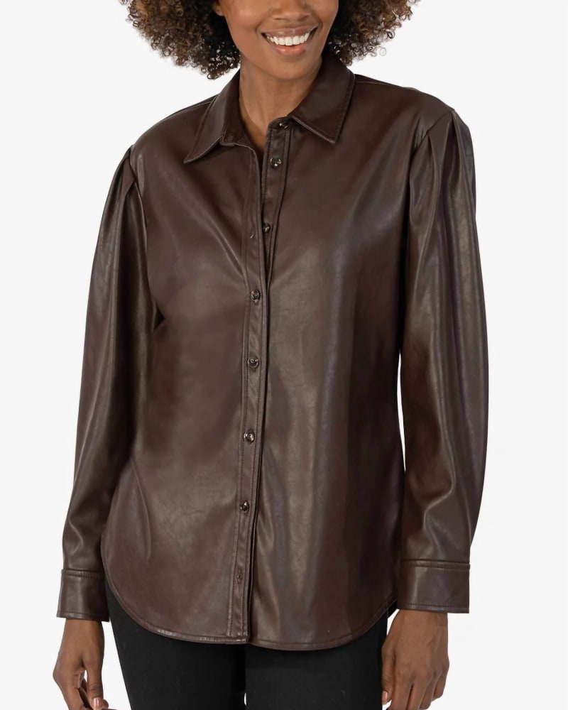 Front of a model wearing a size L Henrietta Pleather Button Down Top in Chocolate in Chocolate by Kut From The Kloth. | dia_product_style_image_id:326872